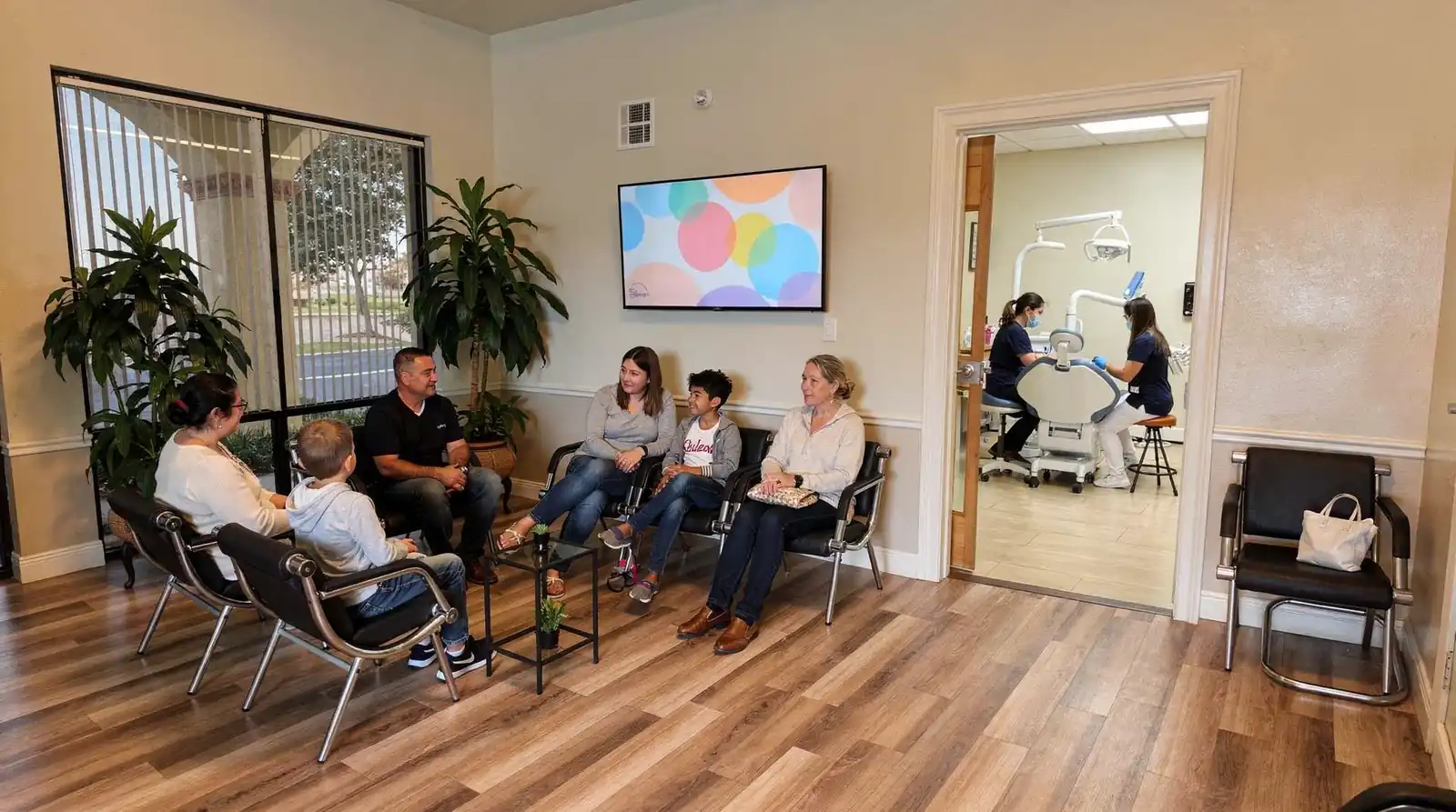 Welcoming dental office waiting area and treatment room at Dental Care of Rialto.